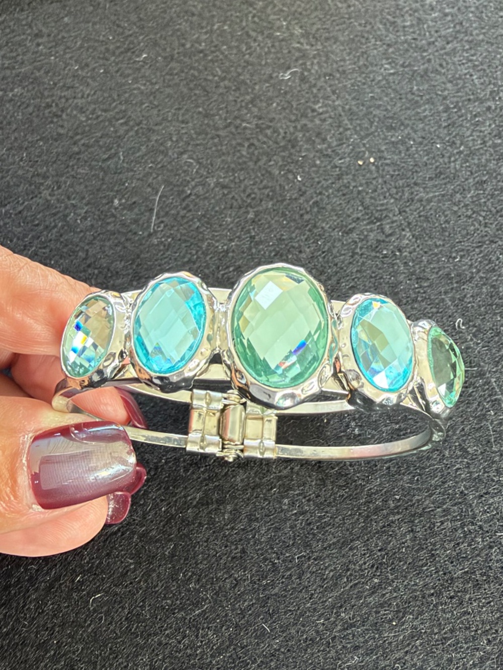 Silver tone cuff bracelet with Oval light-blue/aqua stones